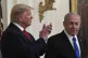 President Donald Trump (left) listens as Israeli Prime Minis
