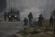Israeli forces clash with Palestinians during a protest agai
