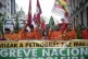 Oil workers march against layoffs at the state oil company P