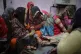 Family members of Rahul Solanki, who was killed during clash