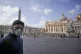 A priest wears a mask in St. Peter's Square at the Vatican