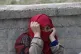 A migrant woman sits at an abandoned building in Edirne, nea