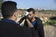 A paramedic from the Palestinian Ministry of Health checks t
