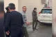 Bayram Mammadov is escorted away by the police 