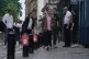 Door staff in PPE and people outside Market Shaker in the Bi