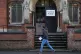 A person walking past Finedon Community Centre in Wellingbor