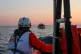 MSF rescuers approach a refugee boat in Malta's search-and-r
