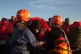 Sea Eye's crew pull refugees from an unseaworthy boat in the