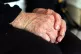The hands of an elderly woman at home, October 7, 2013