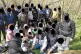 The 34 people (with their faces blacked out) stranded on an 