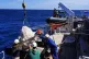 Greenpeace activists prepare to drop a ‘boulder barrier’