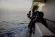 Refugees relax on board the Sea Watch 4