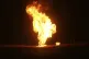 Flames leap into the air after a natural gas pipeline explod