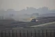An Israeli army APC moves in the Gaza Strip as seen from sou