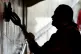 A convicted offender cleans the wall in the Hyde Park subway