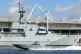 A warship moored outside the Excel Centre, in east London, d
