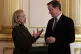 Former prime minister David Cameron talks with former US sec