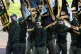 A masked Ulster Defence Association (UDA) colour party at a 