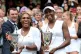 Serena (left) and Venus Williams celebrate victory in the wo