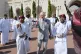 Charles Windsor (centre) takes part in a ceremonial sword da
