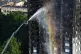 Firefighters spray water after a fire engulfed the 24-storey