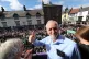 Labour leader Jeremy Corbyn watches the parade from the balc