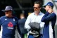 Michael Vaughan chats with England's Joe Root and Trevor Bay