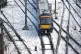 A Scotrail train heads through the snow