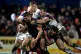 Castleford Tigers Greg Minikin is tackled by Wakefield playe