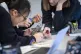 Students use a mobile phone in an art class at Royal High Sc