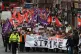 Strikers march to Glasgow Council's city chambers for a mass