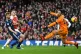 Arsenal’s Granit Xhaka pokes the ball past Fulham’s Serg