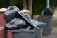 Rubbish bags piled up on top of bins in Edward Road, Birming