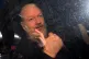 Julian Assange arrives at Westminster Magistrates' Court in 