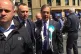 Nigel Farage is escorted away by his hired goons after he wa