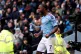 Manchester City's Raheem Sterling celebrates scoring his sid