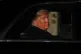 U.S. President Donald Trump leaves after attending an evenin