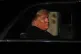 US President Donald Trump leaves after attending an evening 