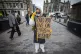 A demonstrator protests against the government's sick pay al