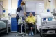 A Rehab Support Worker checks patient Shirley Hughes, 86, as