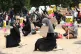 People take a knee during a Black Lives Matter protest rally