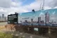 Anti-gentrification graffiti is scrawled on a sign by the en
