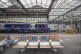 Platform seating with signs that read 