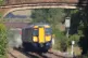A train passes through the shimmering heat from railway line