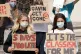 Students take part in a protest in Millennium Square, Leeds