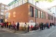 Pupils and parents queue at drop off on the first day back t