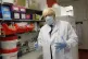 Boris Johnson gestures during a visit to the Jenner Institut