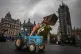 Farmers in tractors take part in a protest over food and far