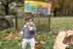 11-month-old Sophie Turpin eating a banana provided by volun