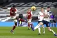 Arsenal's Thomas Partey (left) shoots towards goal during th